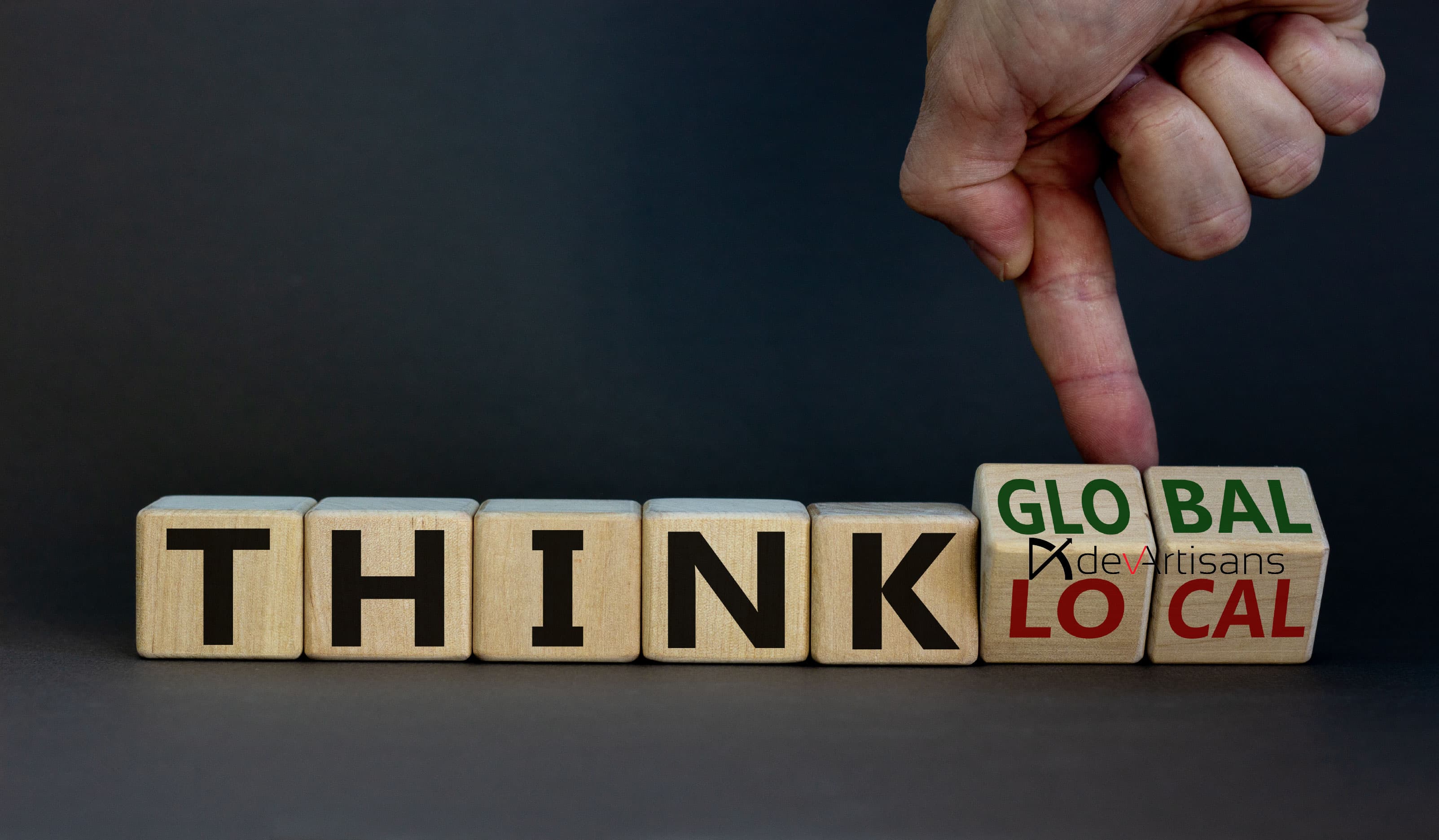 Think global and local concept with wooden blocks